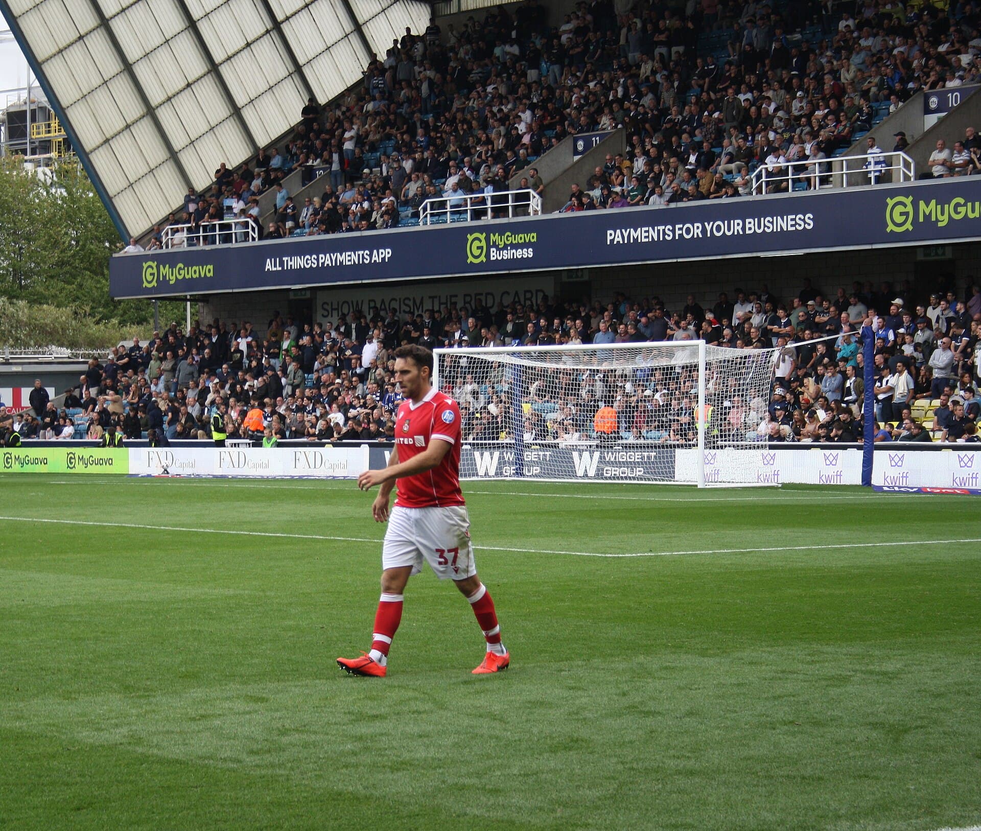 Matty James in Wrexham red during the match at Millwall, August 2025