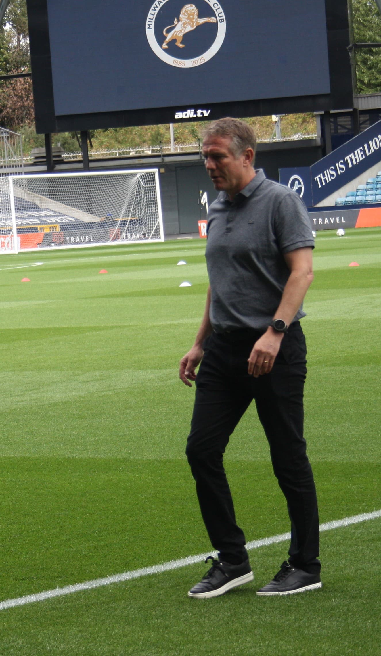 Wrexham manager Phil Parkinson on the pitch before the match at Millwall, August 2025